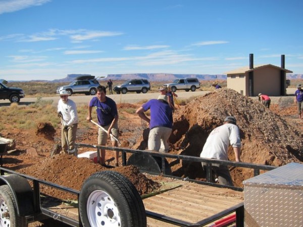 Even Bob digs in to move the gravel