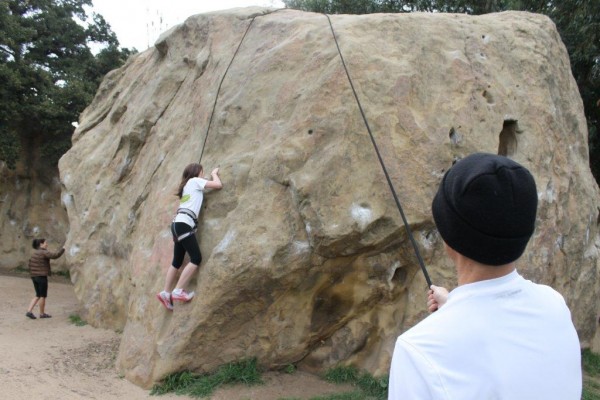 Her first top rope experience.  The freeclimbers were gracious and pat...