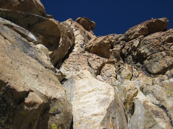 Me bailing on the steep corner of the SE Buttress