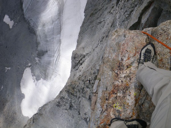 Looking down from P1 belay, Bill in orange helmet below