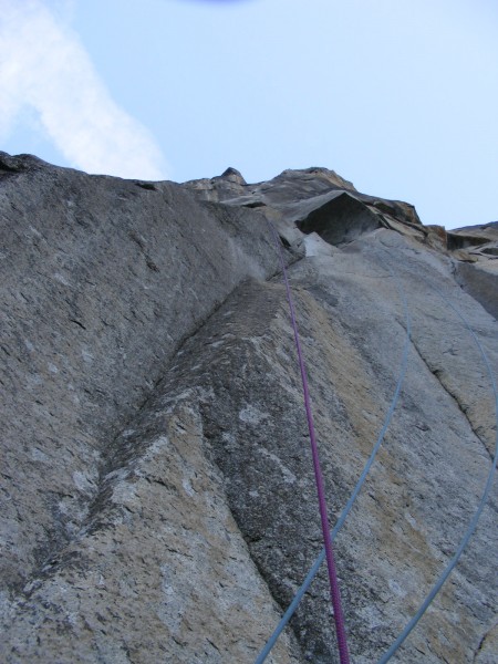 Looking up from the end of pitch 1. The blue rope leading to the pitch...