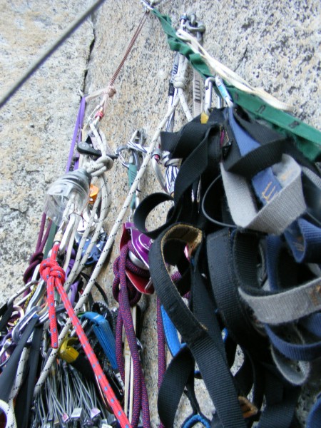 Part of the standard belay station cluster at pitch 6.