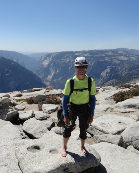 At the summit.  Happy to be barefoot.