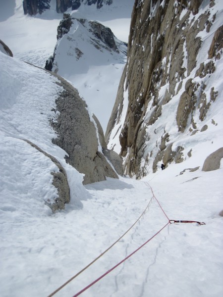 Looking down past an excellent ice screw to Steve at the belay. 
