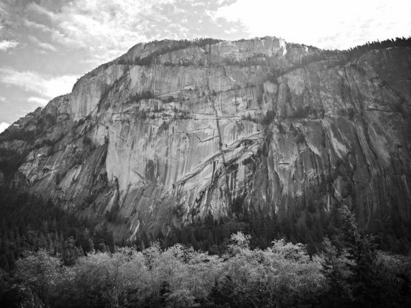 The Grand Wall climbs the unbroken face of The Chief in the left cente...