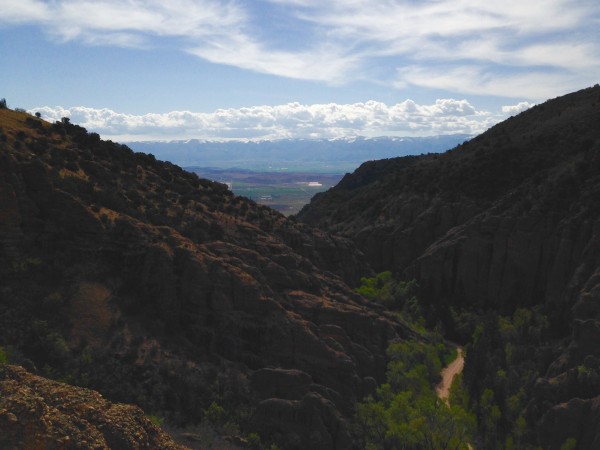 View from the summit looking down canyon. Manti Skyline in the distanc...