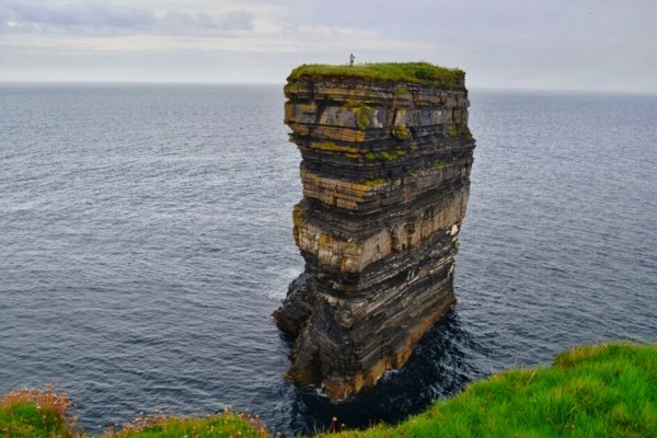 Standing on the sea stack summit