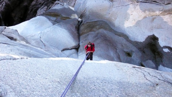 Ky going over the edge.  Photo by Dave.