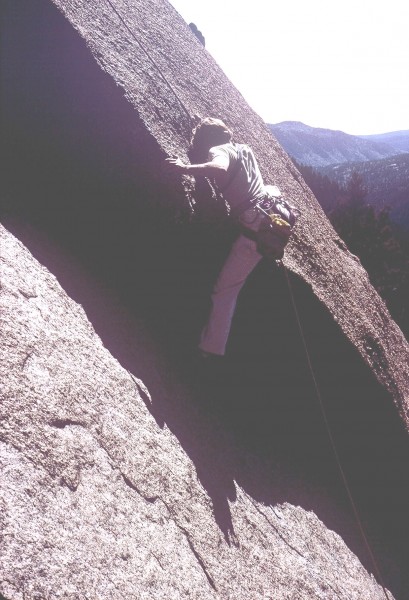 Anne Carrier pulling the crux move of pitch #1. It's probably a true 5...