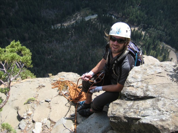 Geoff at the final belay, right after I pulled over the edge to reach ...